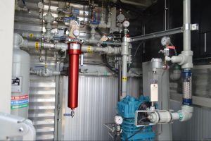 A photo illustrating the key factors to consider when choosing the right compressor for high-H₂S environments.